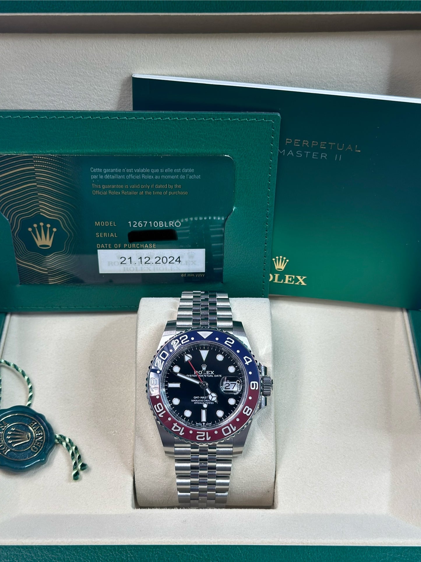 Rolex GMT-Master II Pepsi Black Dial on Oyster 126710BLRO Papers 2024